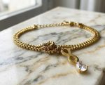 Pulsera infinito, acero 316L chapado oro 18k