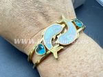 Pulsera delfín nacar ,acero 316 L chapado oro 18k - Imagen 2