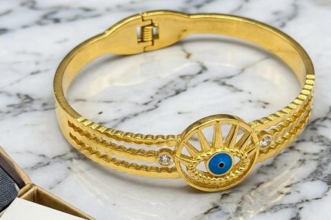 Pulsera rígida ojo turco ,acero 316 L chapado oro 18k