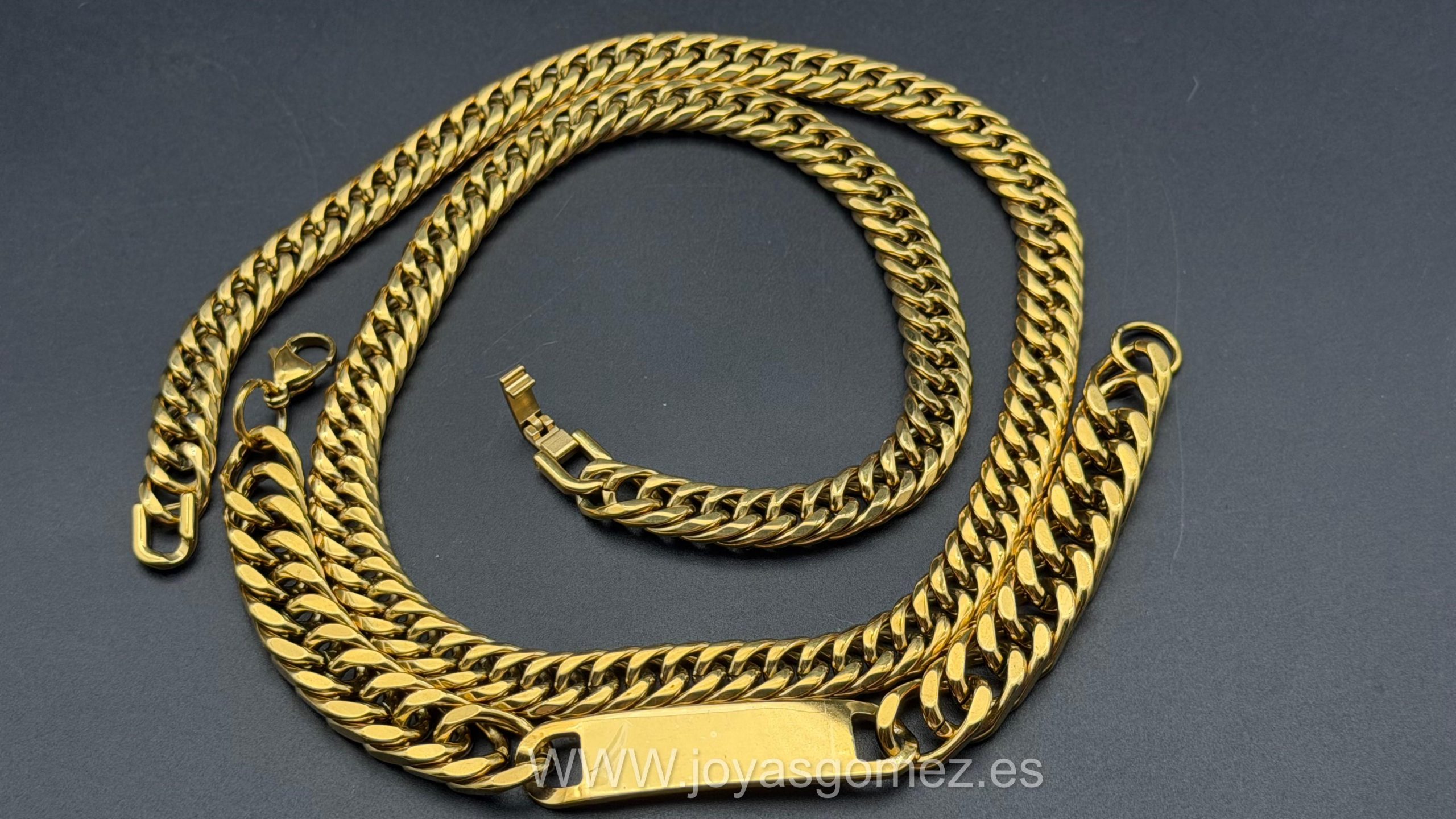 WhatsApp Image 2026-06-22 at 10.41.50 Cadena cubana 10 mm*60cm y esclava 10mm* 21cm, acero 316L, chapado oro 18k - Imagen 1